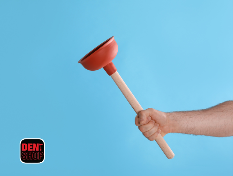 man holding plunger
