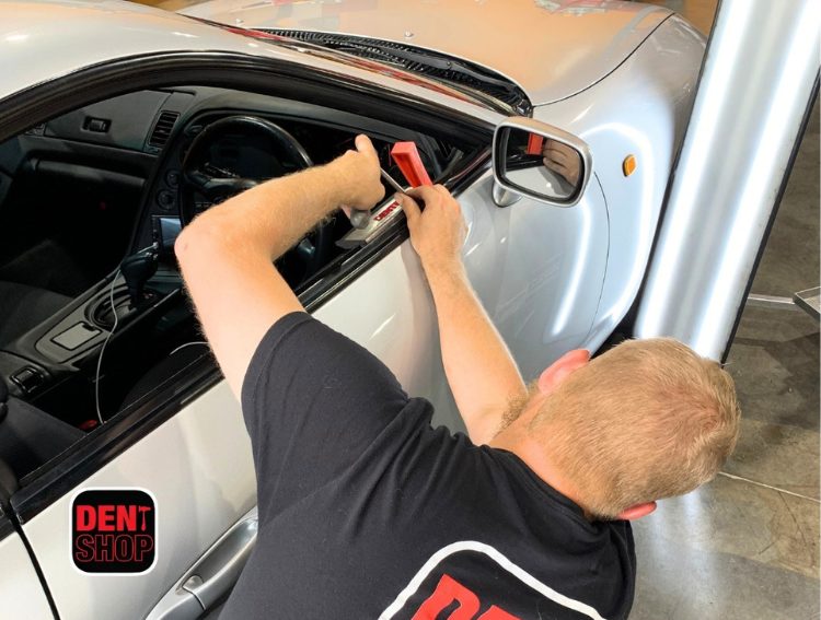 dent shop technician working